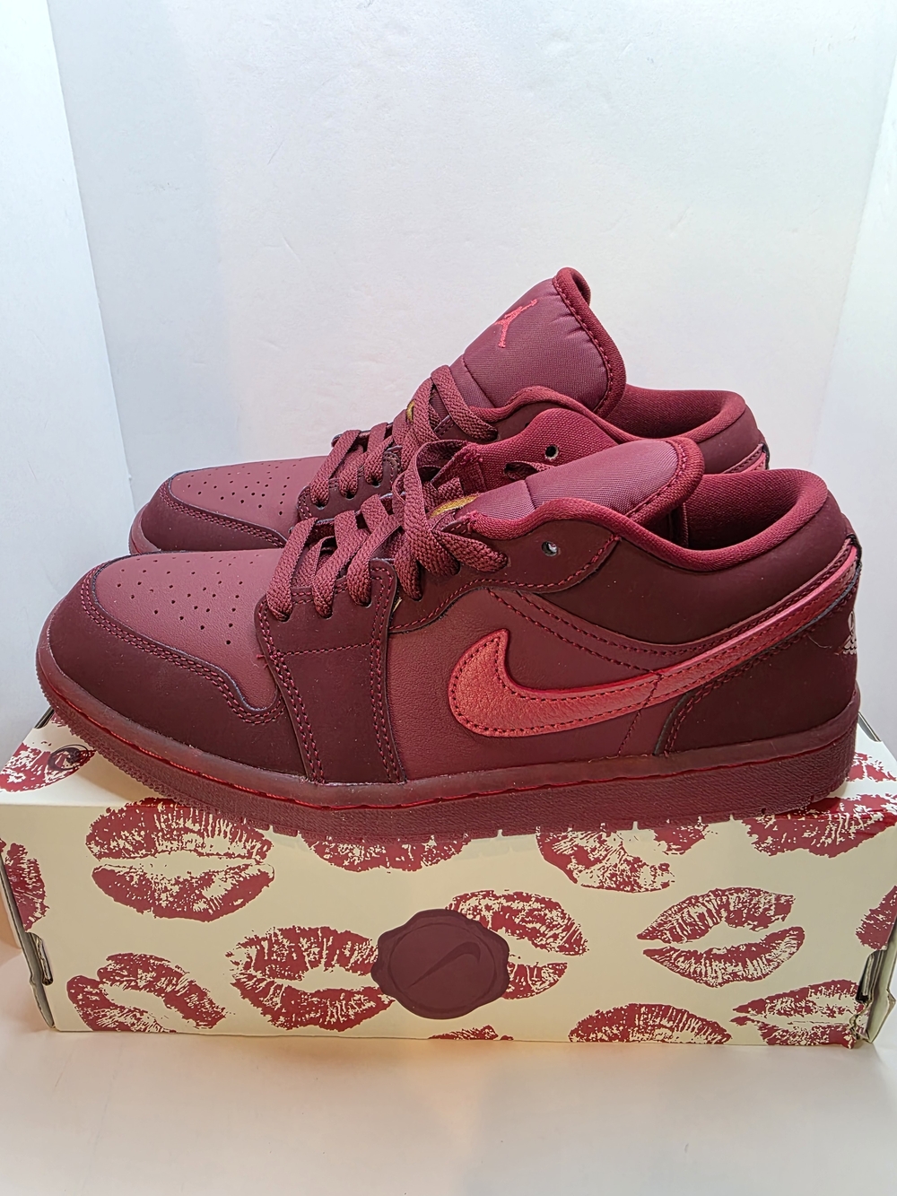 Women's Nike Air Jordan 1 Low SE Valentine's Day sneakers in the Team Red/Sierra